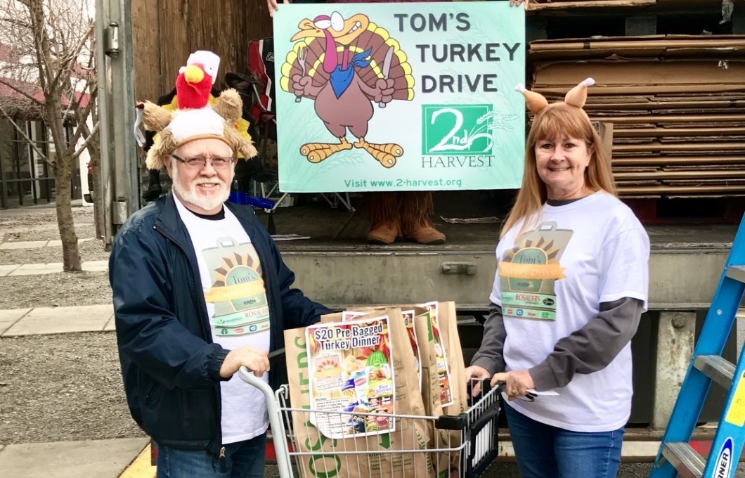 Julie and Dan volunteering for Tom's Turkey Drive