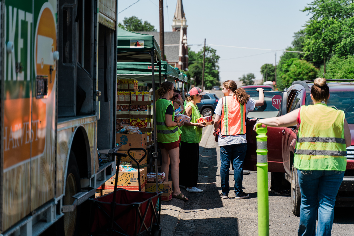 Volunteers distribute food at a Pomeroy Mobile Market